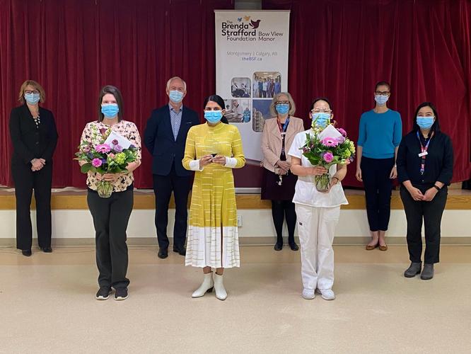 <p>Pictured: BSF Senior Management and IDQI representatives pictured with Research and Innovative Practice Manager Navjot Virk (front middle), and Care Provider of the Year “COVID Heroes" recipient Sarah Allen (left), and finalist Stacy Liu (right).</p>
